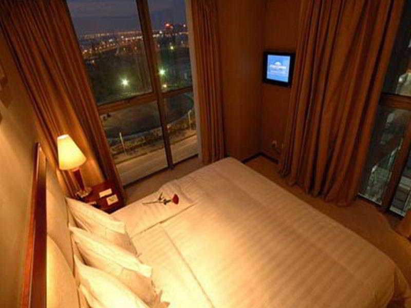 Howard Johnson Hotel Zhangjiang Шанхай Экстерьер фото